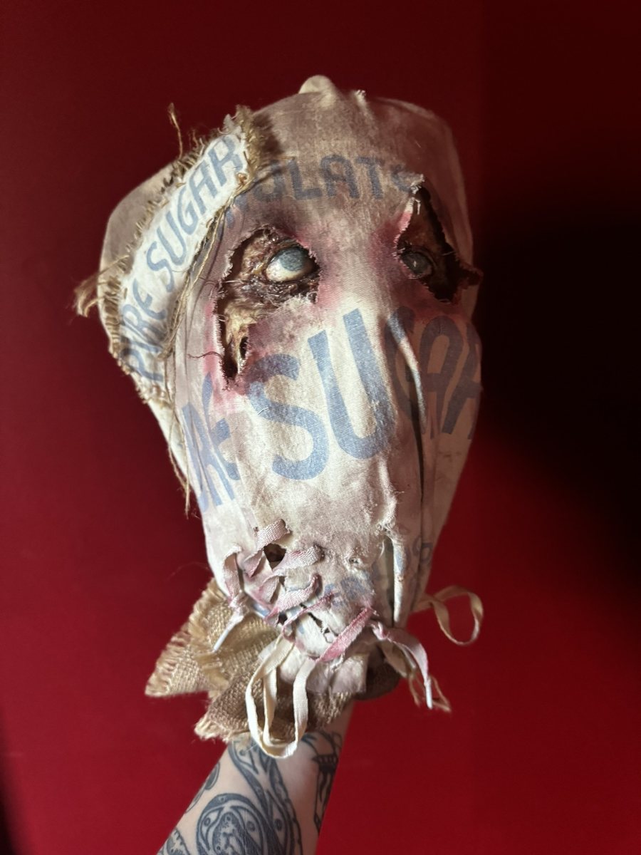 A hand-fabricated horror mask stitched by Eryn Montgomery